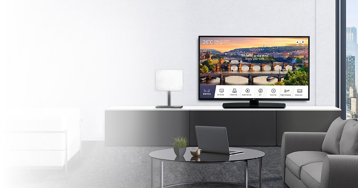Фотоколаж Готельного телевізора UT665H в кімнаті